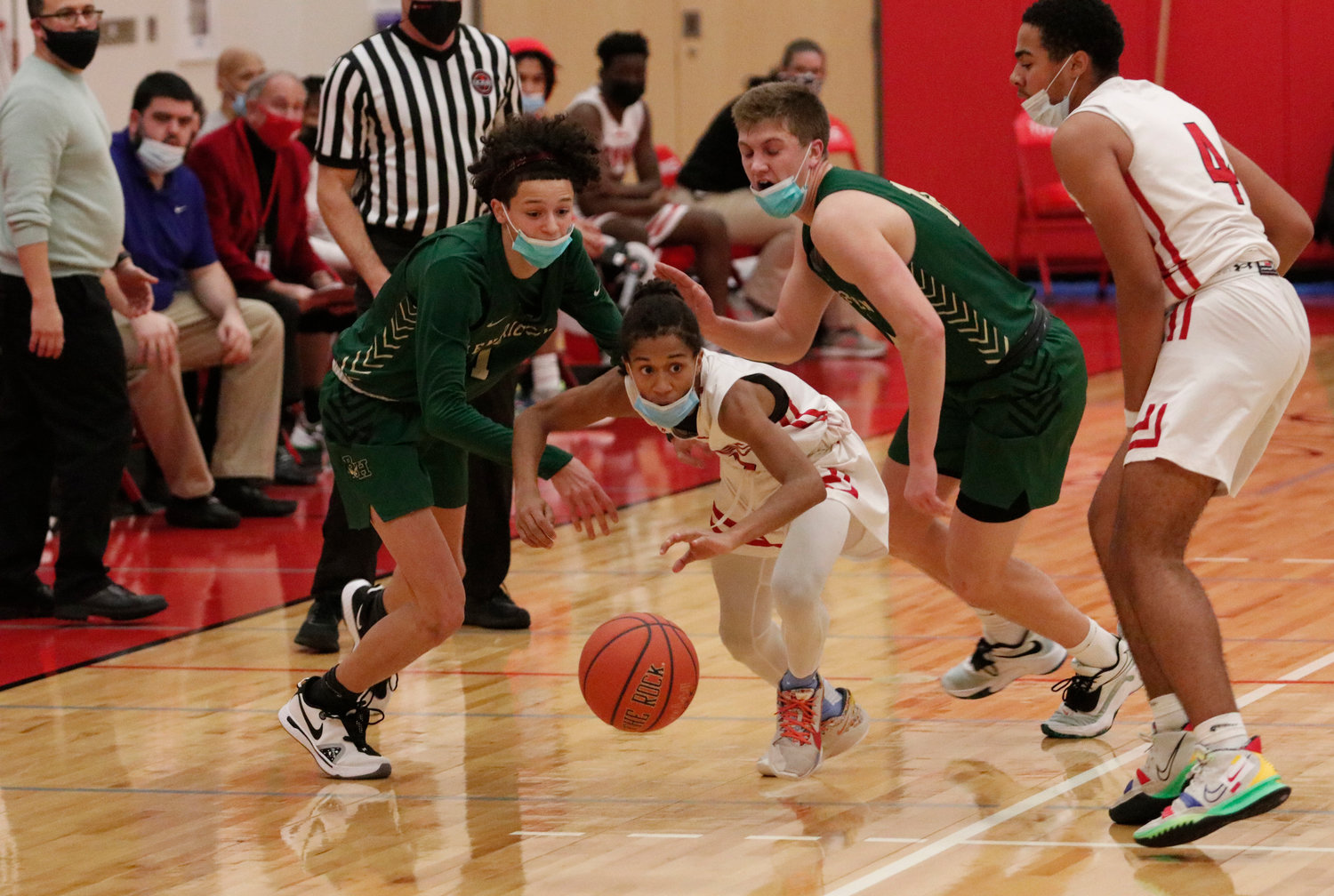 Max Collins dribbles out of trouble with Will Winfield (right).