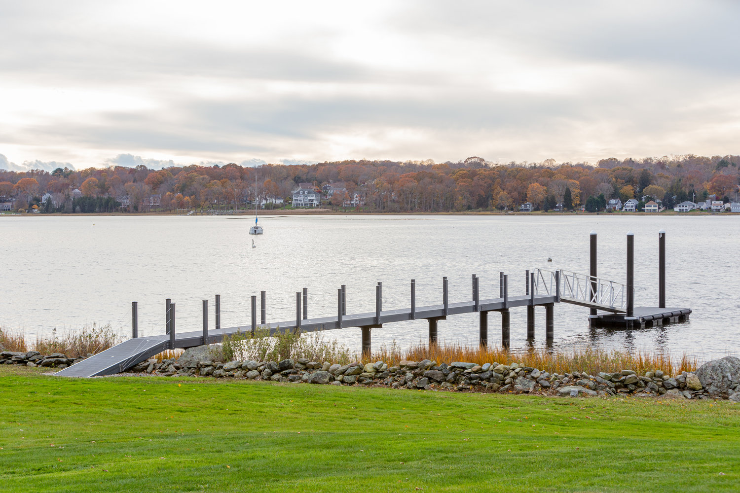 This dock off the western shore of the Touisset peninsula in Warren is the first in Rhode Island constructed of 100 percent composite materials. Pilings, decking and rails are all made of lightweight composite materials.