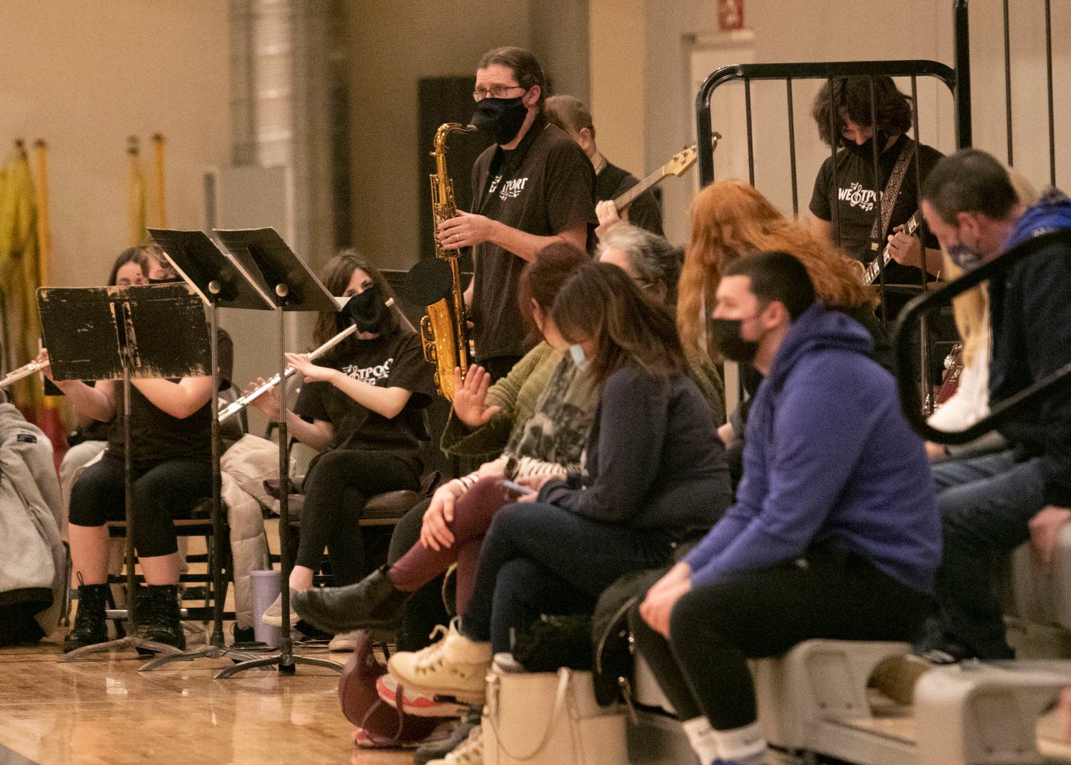 The Westport High School pep band directed by Chris Nunes (sax) was back in the house playing the “Cupid Shuffle,” “Crazy Train” and more. For now the band will play in the south corner of the gym.
