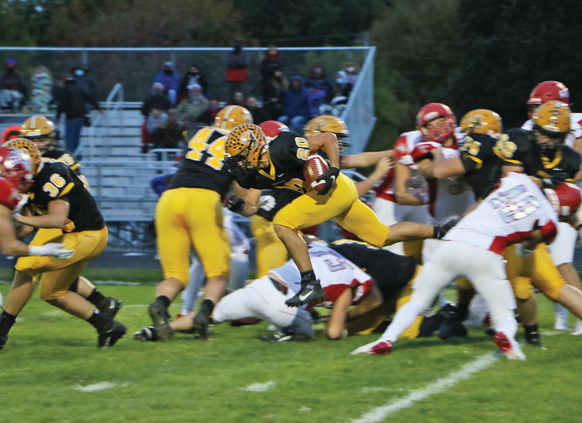 POWER IN MOTION -- Cole Shirk finds an opening during Friday&rsquo;s 36-35 Homecoming win over West Sioux. Shirk would pick up 158 yards on the night. -- Joseph Schany photo