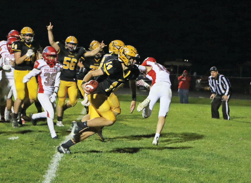 FOR THE WIN -- Senior Ben Dunlap runs across the goal line for a two-point conversion and the 36-35 E-Hawk win during Friday night&rsquo;s Homecoming victory over West Sioux in overtime. 	 -- Joseph Schany photo
