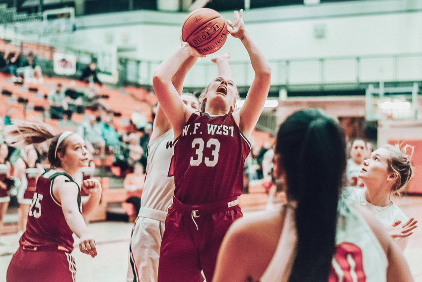 W.F. West's Annika Waring looks for room to shoot against Black Hills on Friday during the District 4 2A Girls Basketball Tournament championship game in Battle Ground.