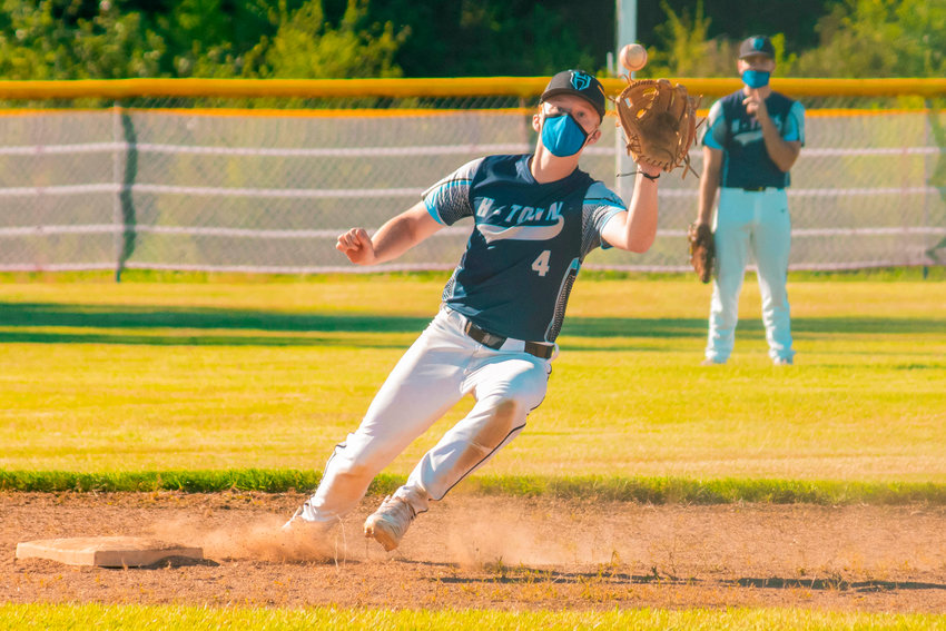 Hockinson&rsquo;s Blaine Hardy (4) recieves a throw to second base during a game against Rural Baseball Inc. Wednesday evening at Winlock High School.
