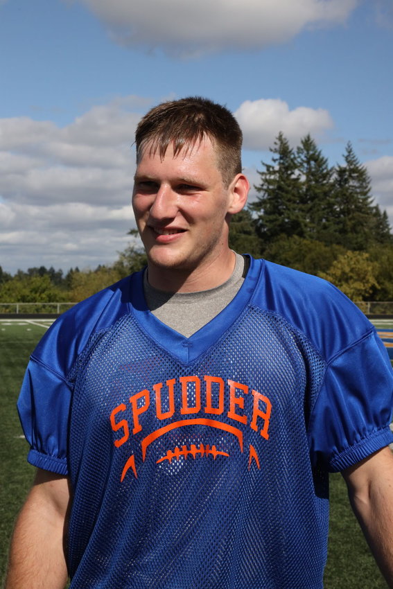 Trey Knight, a senior at Ridgefield High School, has broken numerous local and state records in track and field events during his time as a Spudder.