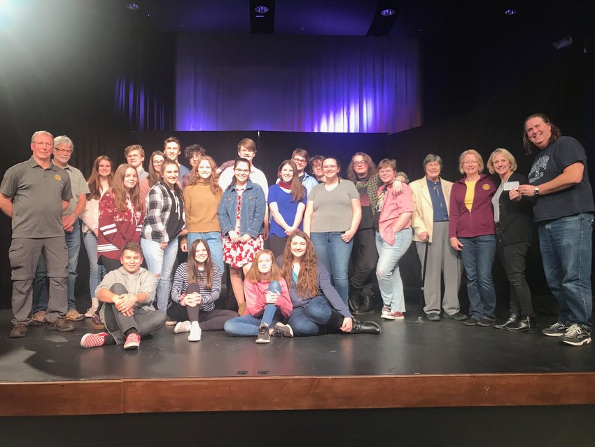 Members of the Lewis River Rotary Club recently donated $3,000 to the Battle Ground Drama Club to help fund its trip to Scotland.