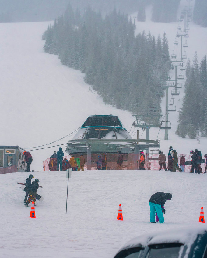 Crowds line up to ride &lsquo;The Great White Express&rsquo; at the White Pass Ski Area on Sunday.