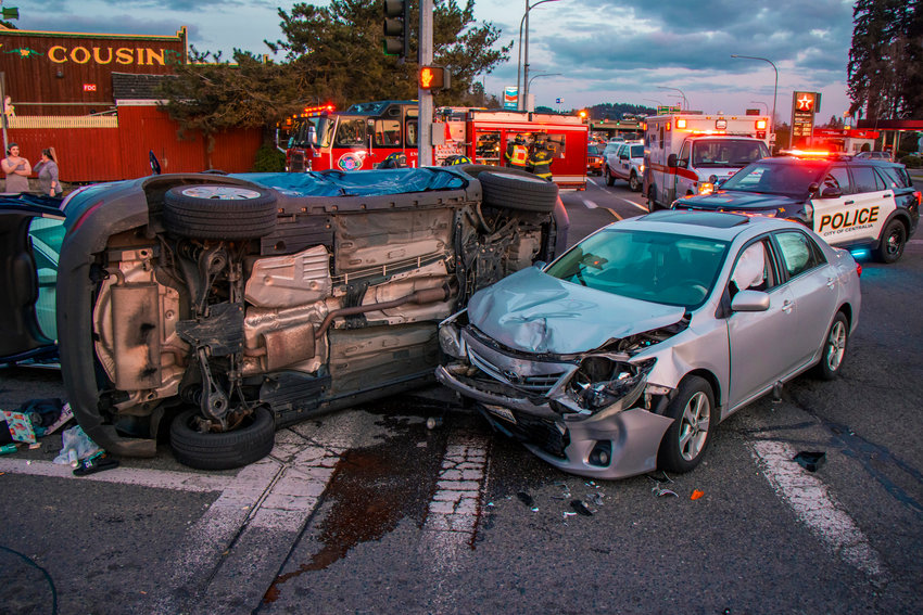 Emergency crews respond to the scene of a multi-vehicle collision at the intersection of Harrison and Belmont Avenue in Centralia on Wednesday.