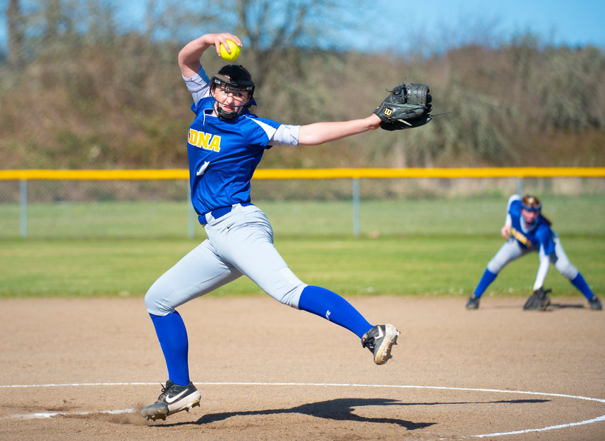 FILE PHOTO -Adna ace Haley Rainey winds up to deliver a pitch to a Toledo batter on Monday.