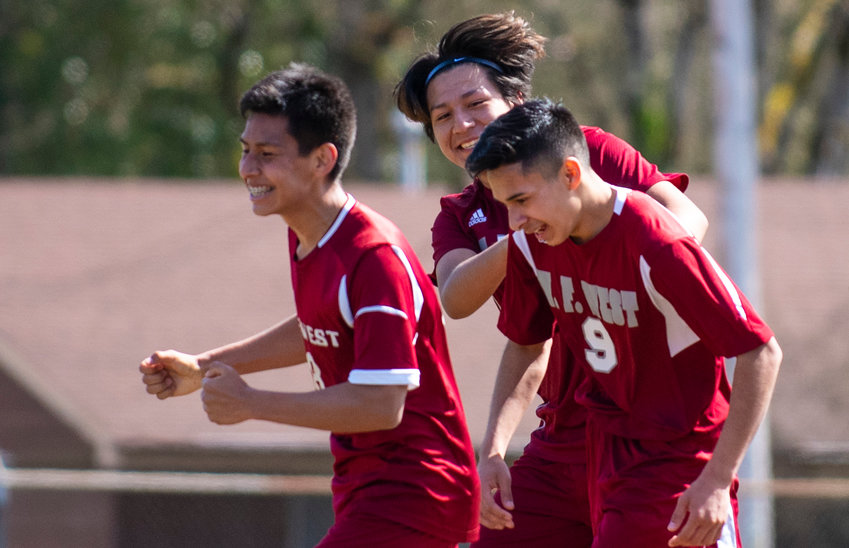 W.F. West's Carlos Hernandez (9) celebrates his first of three goals against Rochster at home on Tuesday.