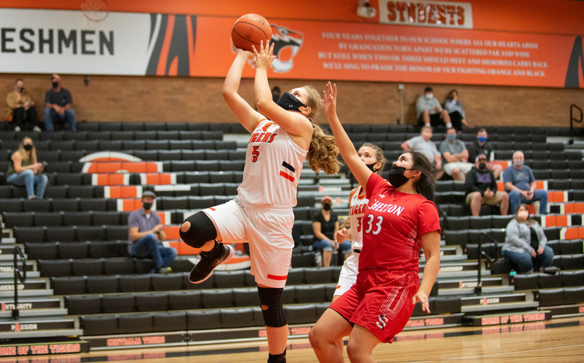 Centralia's Emily Wilkerson drives for two points against Shelton on Friday at home.