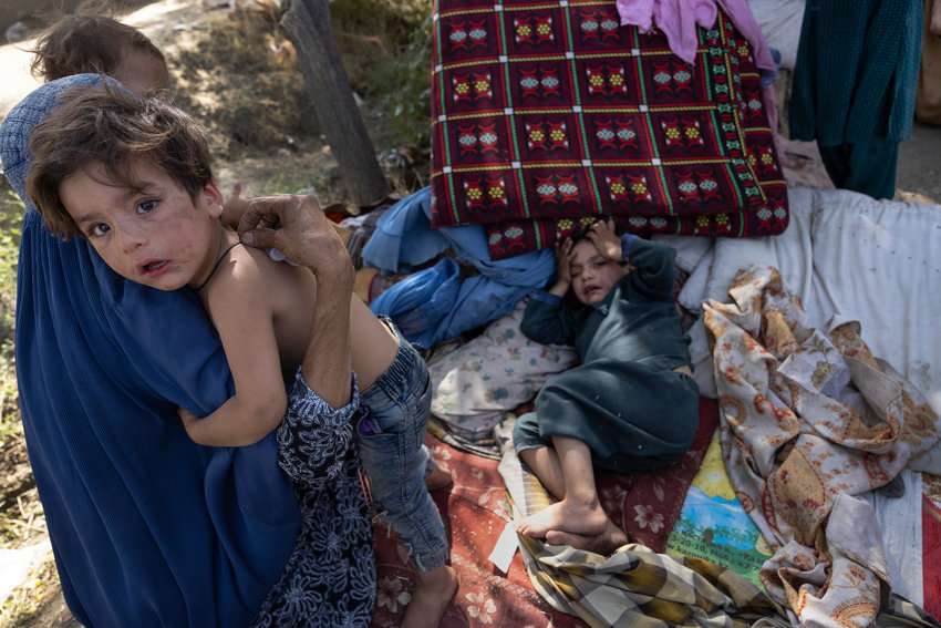Displaced Afghans arrive at a makeshift camp from the northern provinces desperately leaving their homes behind on Tuesday, Aug. 10, 2021, in Kabul, Afghanistan. (Paula Bronstein/Getty Images/TNS)