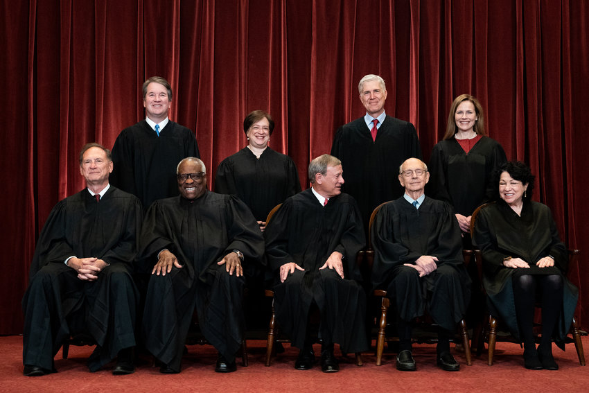 Members of the Supreme Court pose for a group photo at the Supreme Court in Washington, D.C., on April 23, 2021. Seated from left: Associate Justice Samuel Alito, Associate Justice Clarence Thomas, Chief Justice John Roberts, Associate Justice Stephen Breyer and Associate Justice Sonia Sotomayor, Standing from left: Associate Justice Brett Kavanaugh, Associate Justice Elena Kagan, Associate Justice Neil Gorsuch and Associate Justice Amy Coney Barrett. The Supreme Court term that starts Monday is about more than the abortion issue. (Erin Schaff-Pool/Getty Images/TNS)