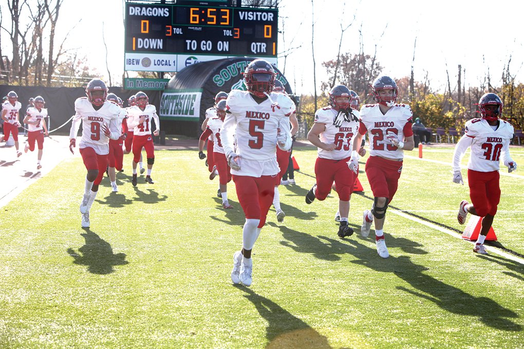 Mexico players march to the field before their Class 3 state semifinal game against St. Mary’s. [Theo Tate]
